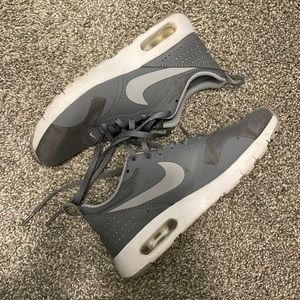 grey nike shoes